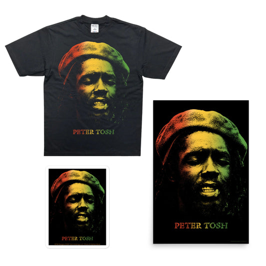 A black graphic T-shirt shown with matching printed graphics on a white background, including a large front print, a smaller inset print, and a vertical poster-style print. The artwork features a stylized portrait in green, yellow, and red tones with the text 'PETER TOSHI' below.
